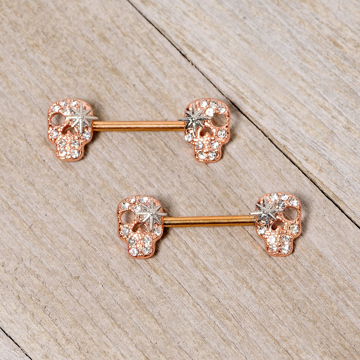 14G Clear Gem Rose Gold Tone Star Skull Barbell Nipple Ring Set