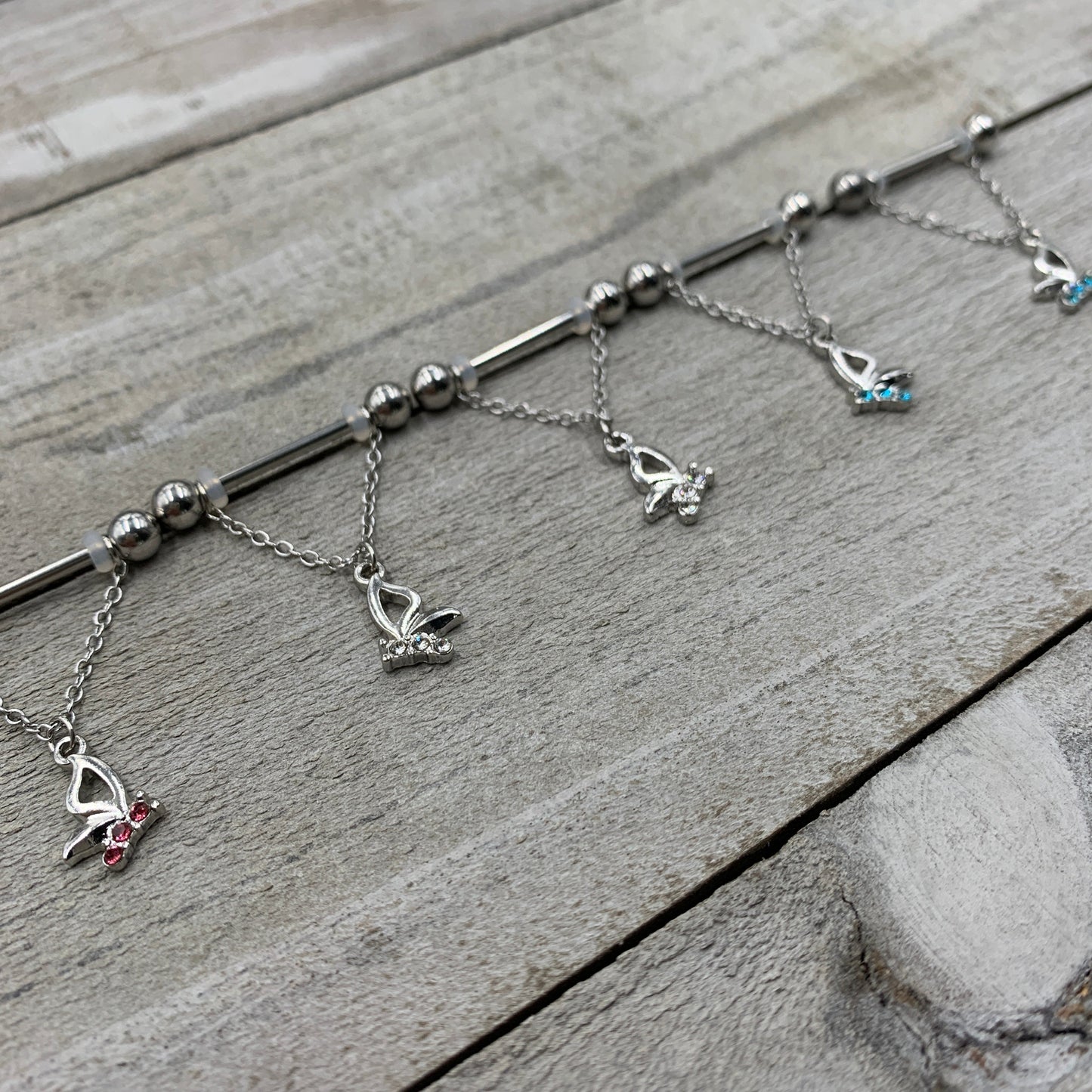 14G 5/8 Aqua Gem Hollow Butterfly Chain Dangle Nipple Ring Set