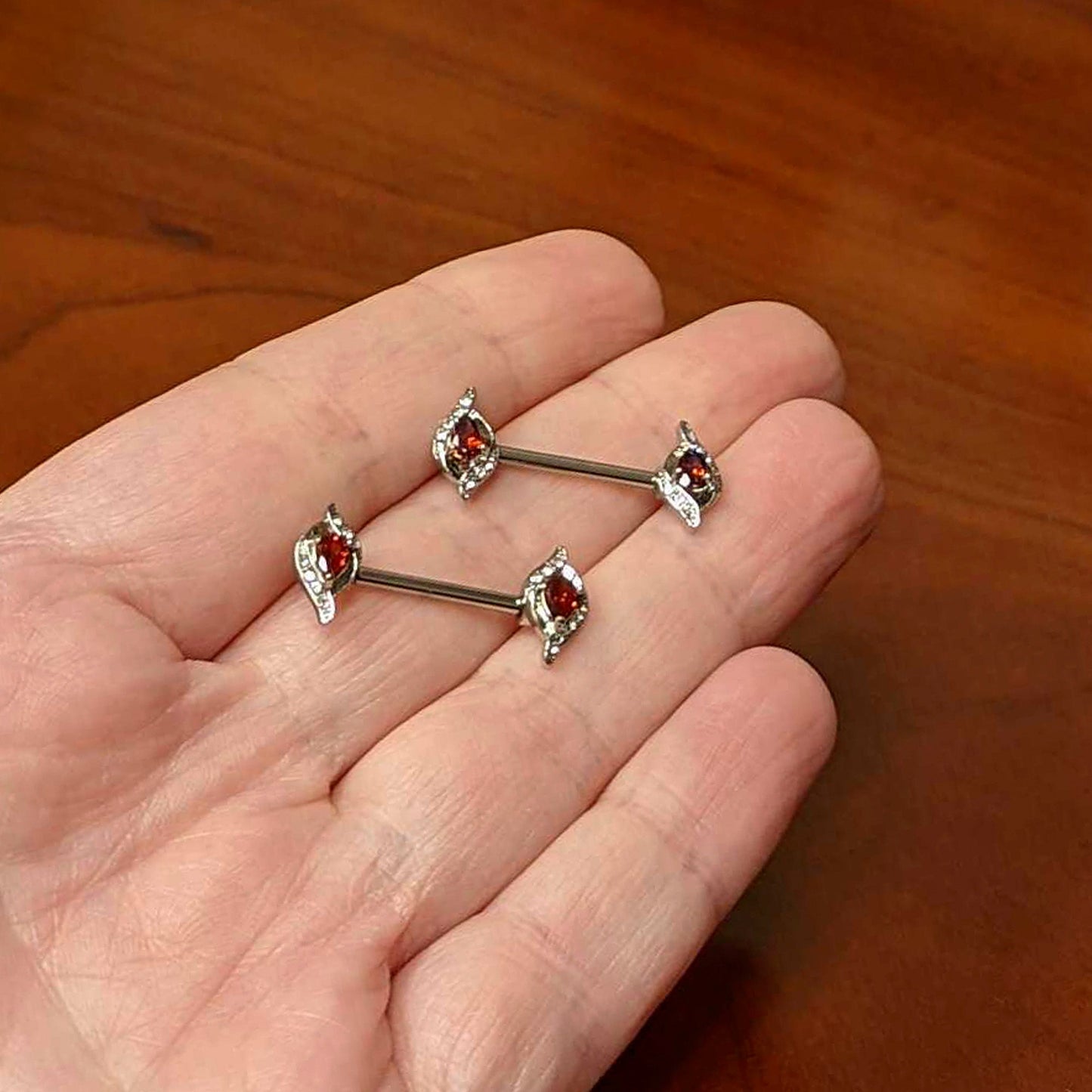 14G 9/16 Clear Red Gem Swirling Oval Barbell Nipple Ring Set