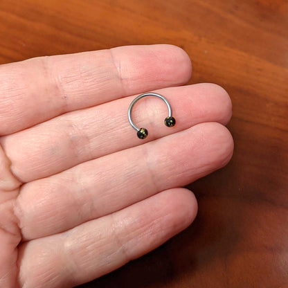 16G 3/8 Matte Black Splatter Ends Horseshoe Circular Barbell