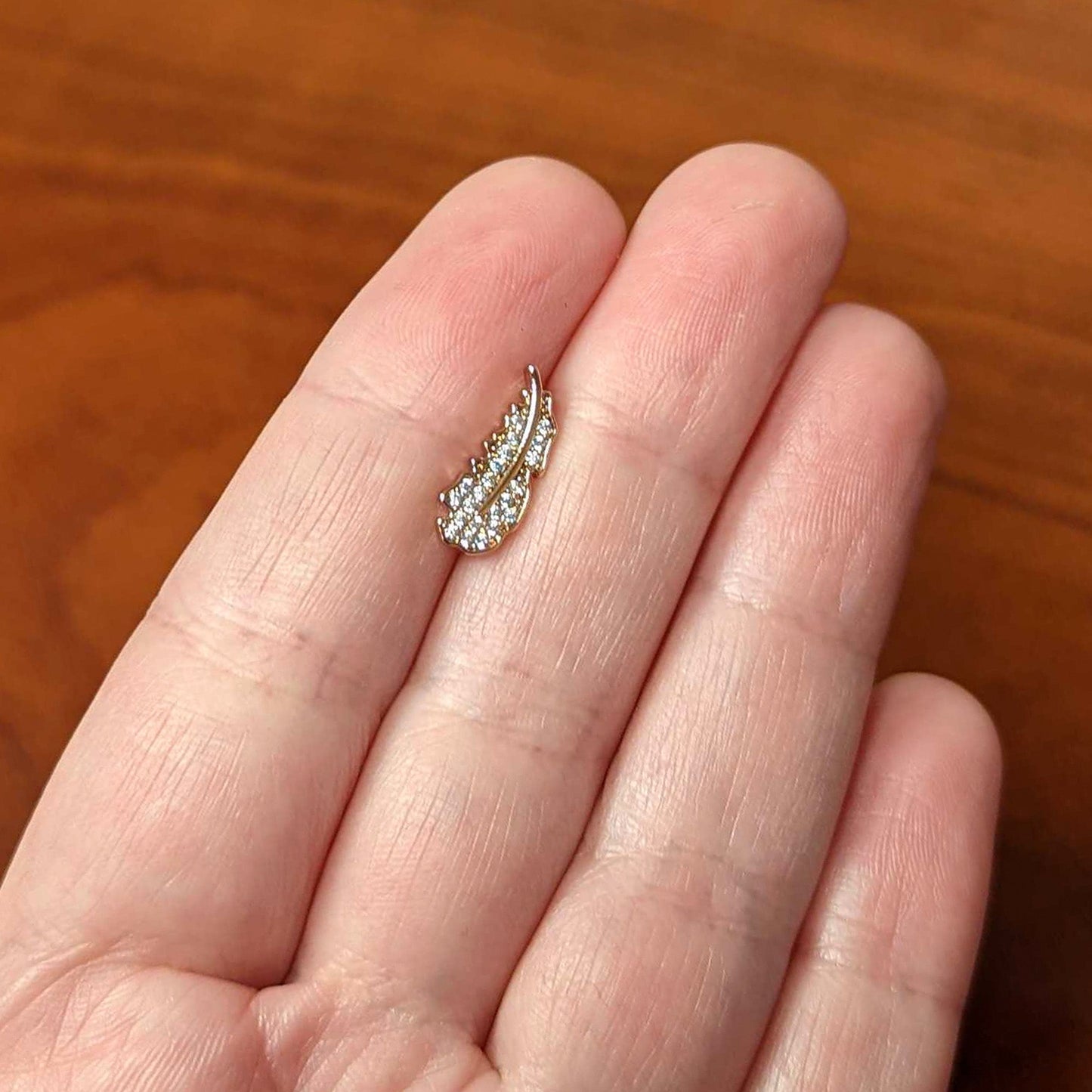 16G 1/4 Clear CZ Rosy Hue Feather Internal Threaded Labret Tragus