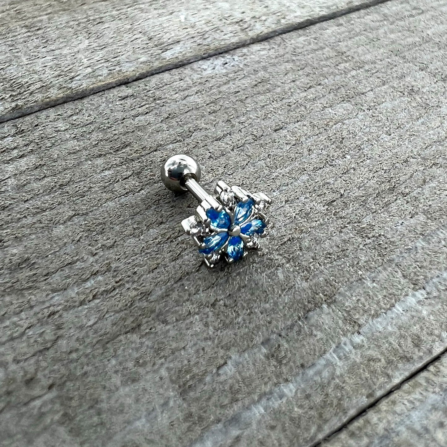 16G 1/4 Blue CZ Gem Floral Burst Cartilage Tragus Earring