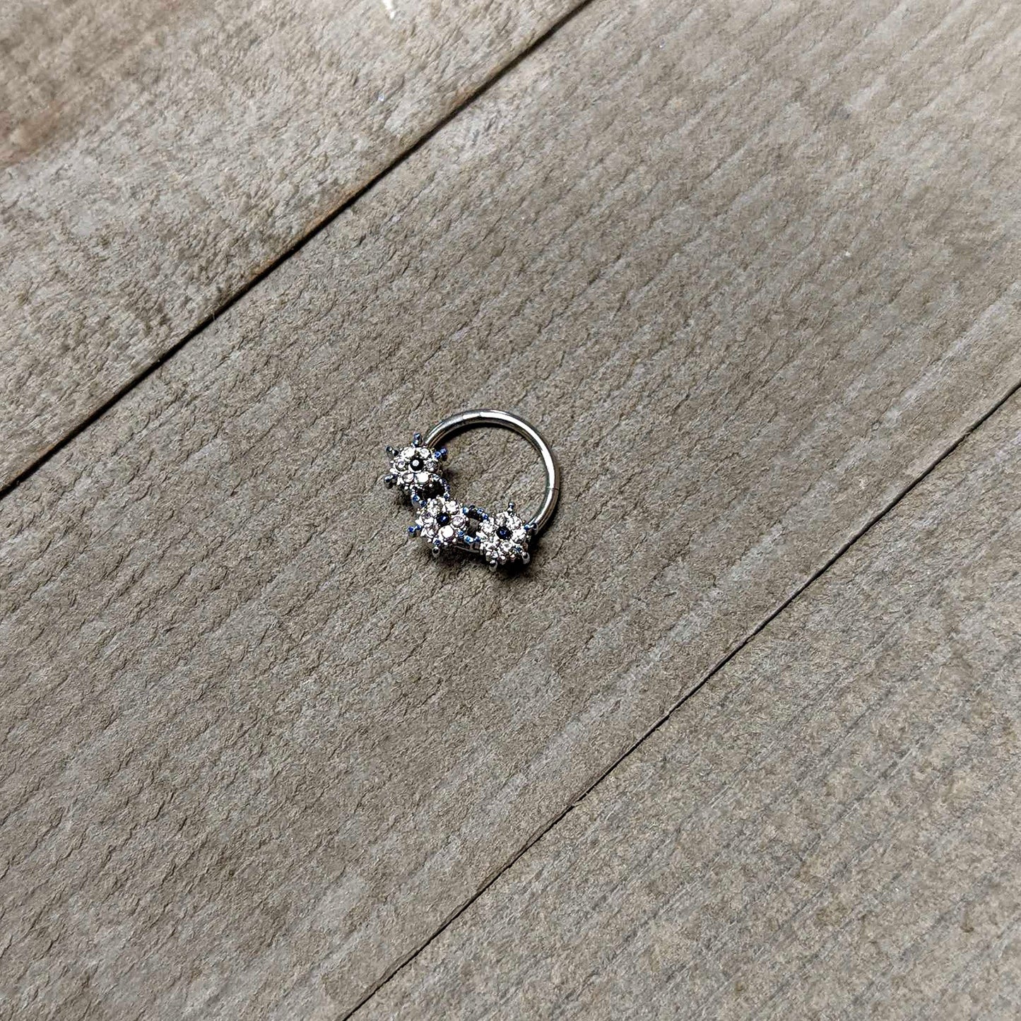 16G 3/8 Clear Blue Gem Festive Trio Snowflake Hinged Segment Ring