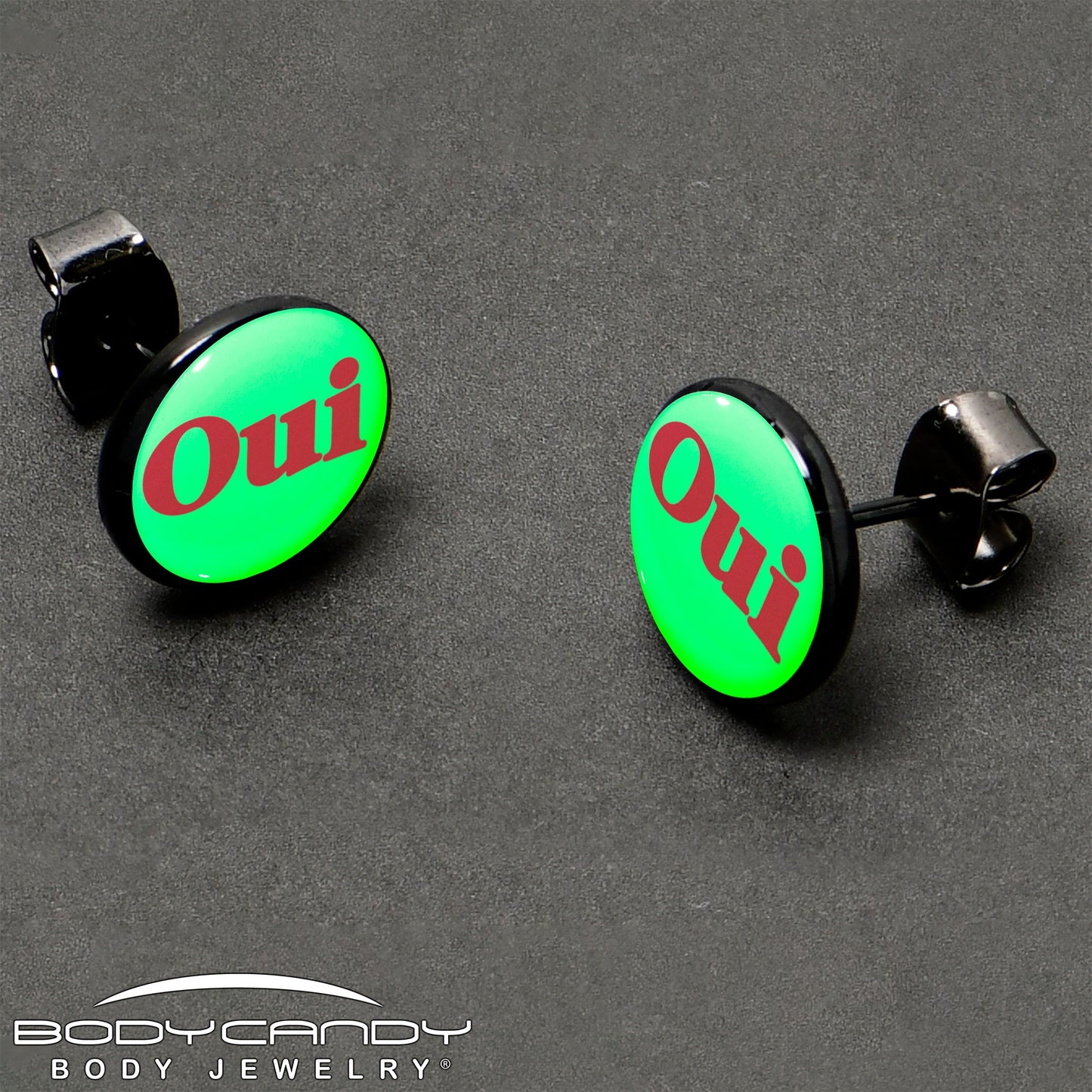 Black Anodized OUI Glow in the Dark Stud Earrings by Onyx O